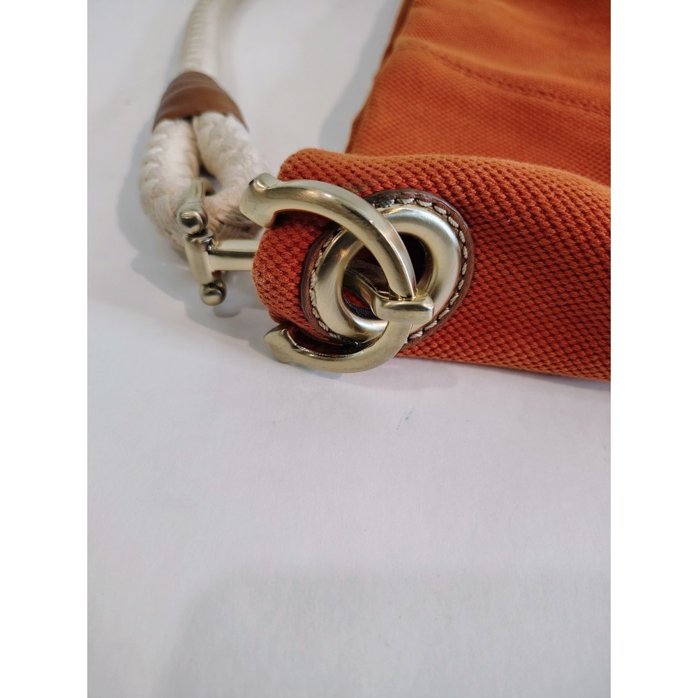 Michael Kors Marina hobo bag features an orange canvas body with braided rope... - Picture 3 of 11